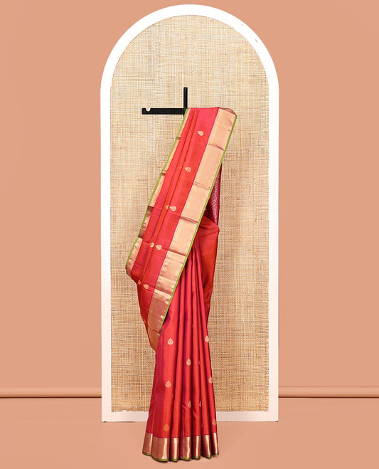 Orange Kanchipuram Silk Saree, Adorned with Zari Buttas, Contrast Thilakam Zari Border, Pallu of Butta Enclosed Checks, and a Contrast Blouse
