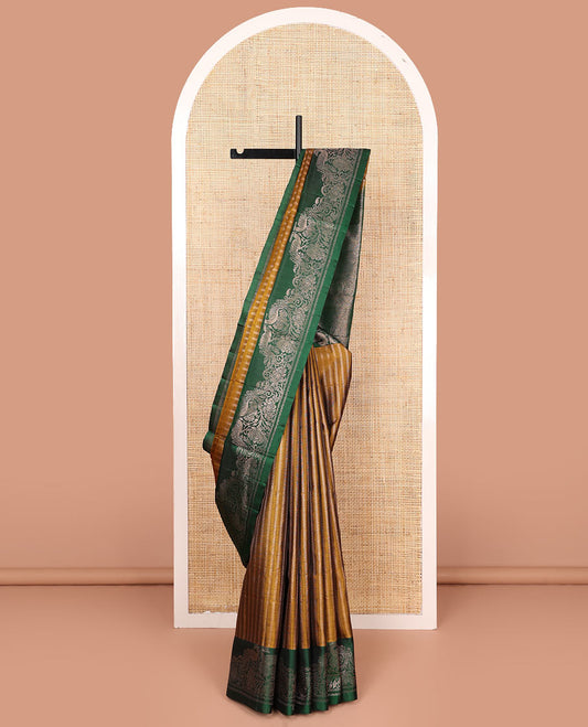 Mustard neli striped soft silk saree, contrast border of neli, and peacock designs, and pallu of vanki, and sepppu rekku designs