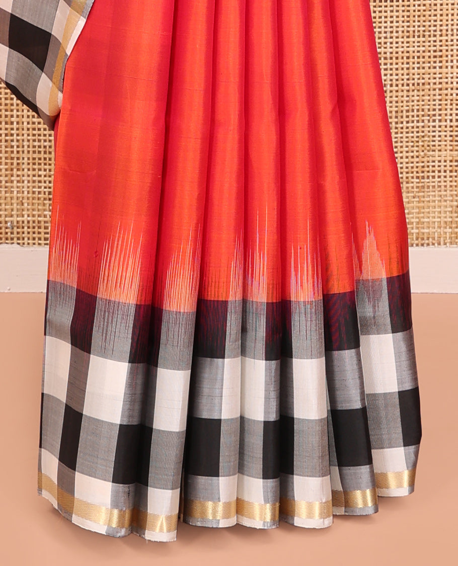 Orange Plain Mayuri Soft Silk Saree, Complemented by a Contrast Black-White Chess-Style Checked Border, Chess-Style Checked Pallu, and Paired with a Contrast Blouse