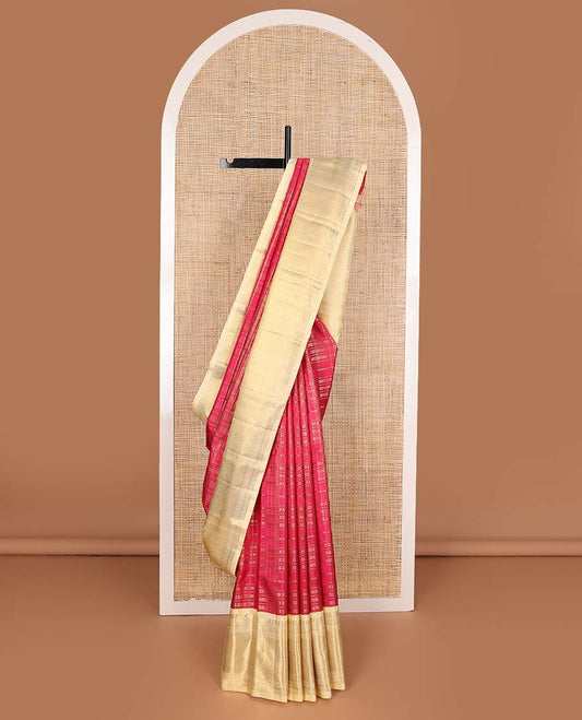 Red muthu striped silks saree, contrast border of manga mokku, muthu, poun, and mayli kann designs, and zari design pallu