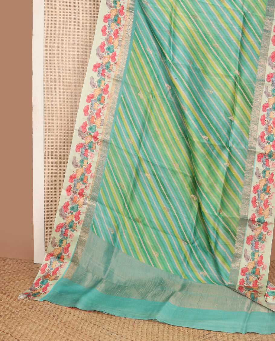 Blue lehariya-style stripes printed tussar saree with zari buttas, contrast traditional zari border of pichwai multi-color floral & cow motifs print & zari striped pallu