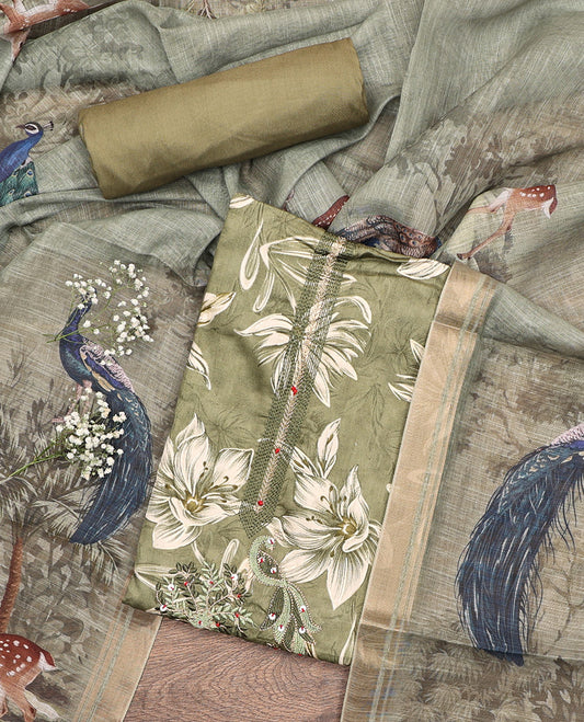 Green Material Chudidar Set, Beautified with Floral Print, and Embroidery on Its Muslin Top, a Plain Cotton Bottom, and Paired with a Peacock Printed Lilan Cotton Dupatta