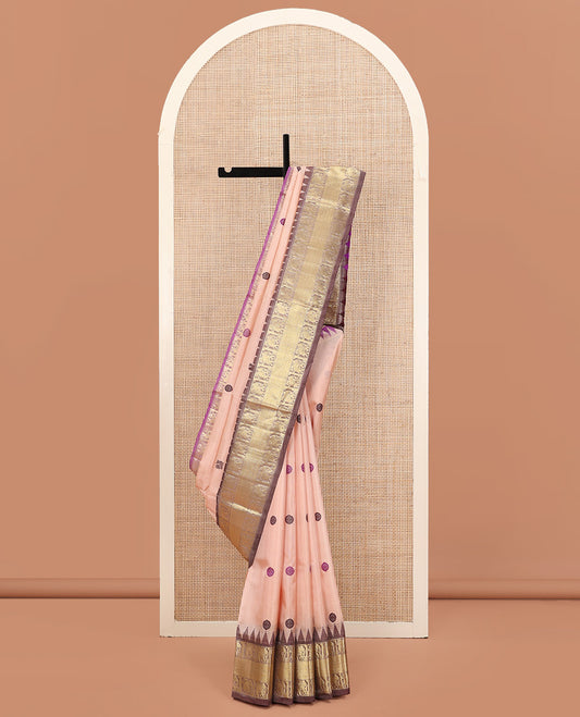 Peach Venkatagiri Silk Saree, Subtly Sparkled with Peacock and Chakram Buttas All Over Its Body, Complemented by a Contrast Temple Border of Elephant and Geometric Designs, Pallu of Geometric Designs, and Paired with a Contrast Blouse