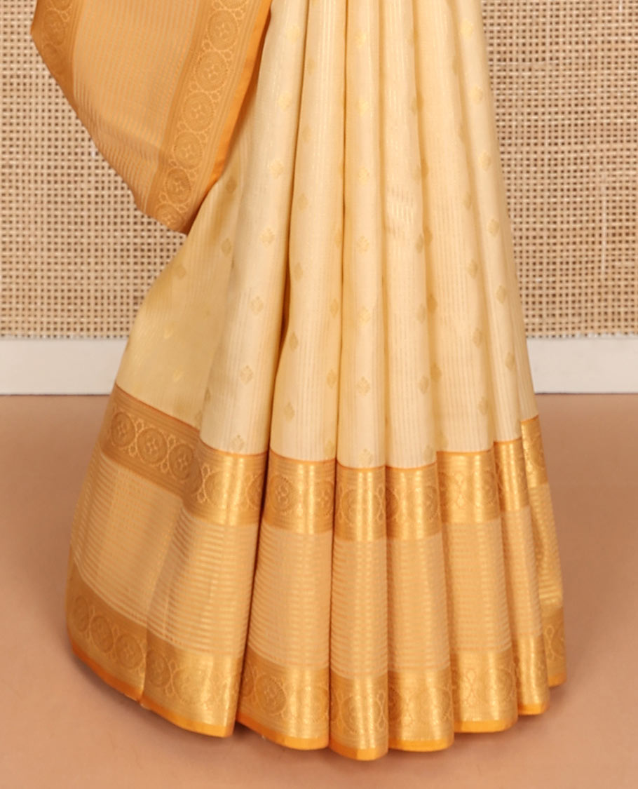 Cream zari buttas woven Vasundhara silk mix saree, contrast border of banaras, muthu & chakram designs & zari-rich pallu