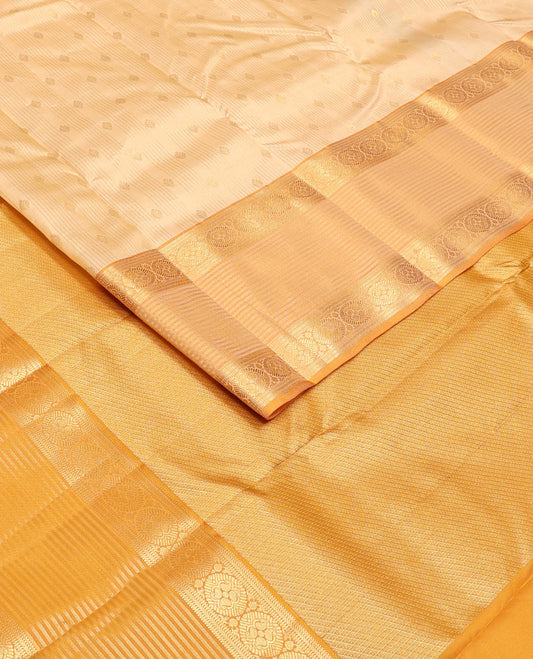 Cream zari buttas woven Vasundhara silk mix saree, contrast border of banaras, muthu & chakram designs & zari-rich pallu