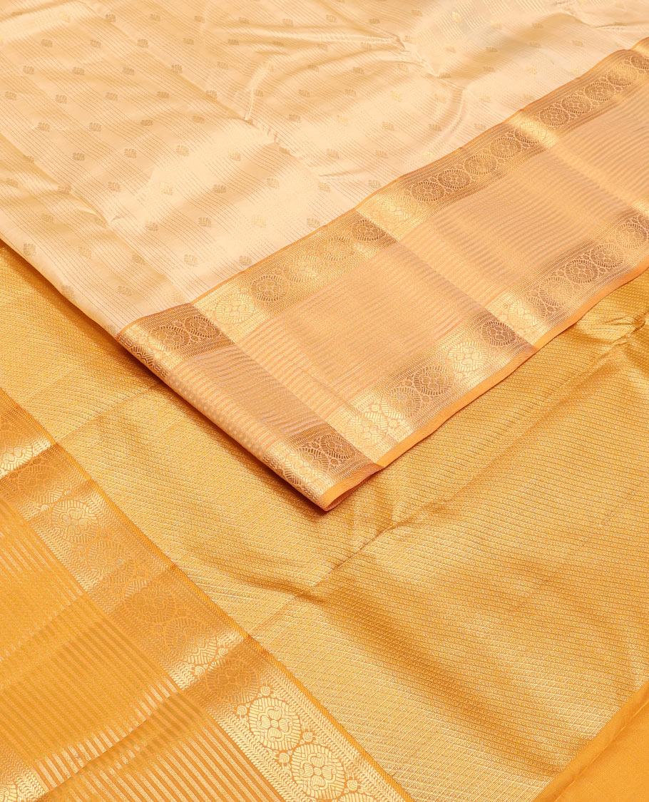 Cream zari buttas woven Vasundhara silk mix saree, contrast border of banaras, muthu & chakram designs & zari-rich pallu