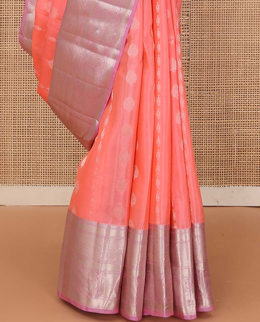 Peach zari buttas Vasundhara silk mix saree, contrast border of rekku, banaras, muthu, and mayil chakram design, and jaal pallu