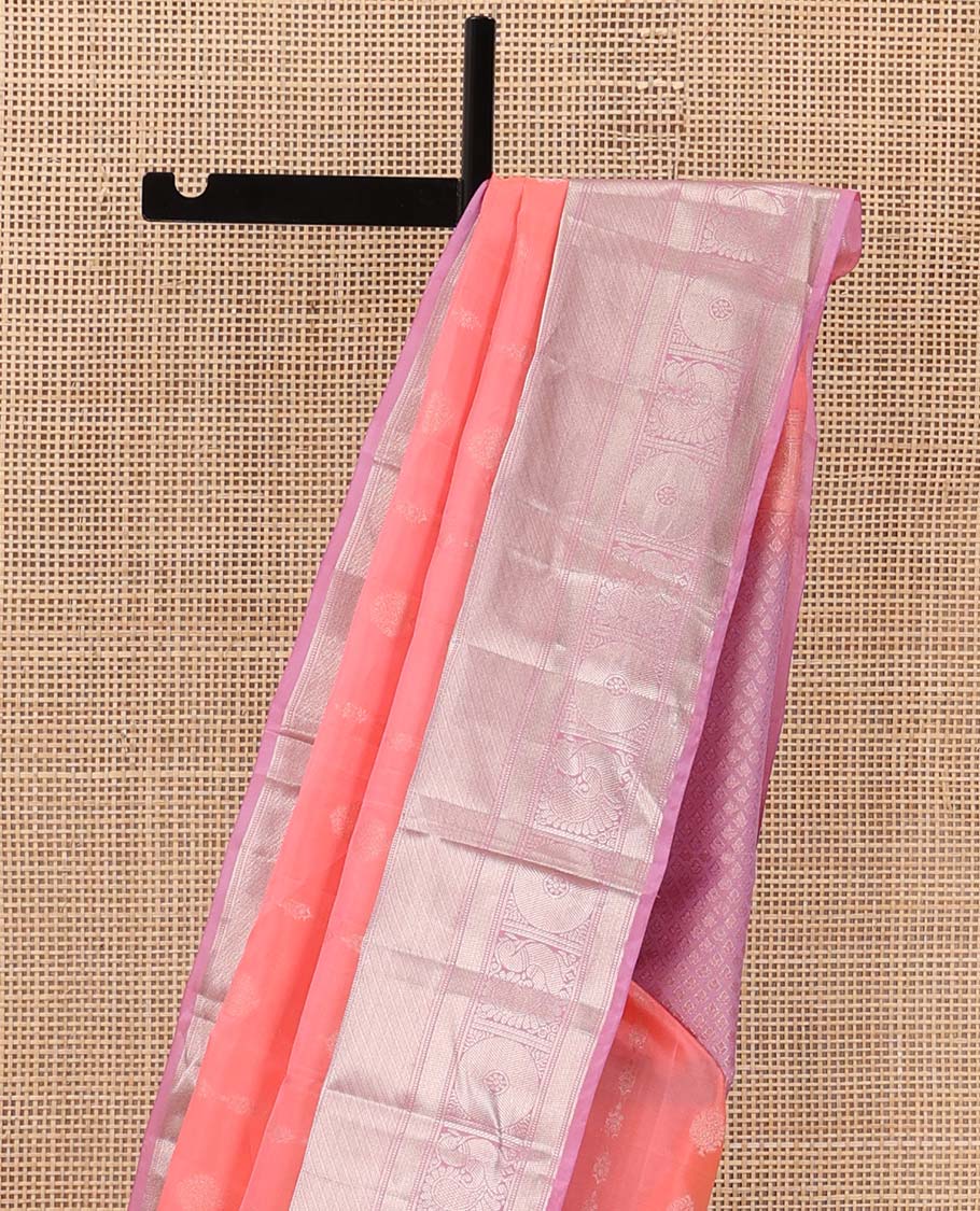 Peach zari buttas Vasundhara silk mix saree, contrast border of rekku, banaras, muthu, and mayil chakram design, and jaal pallu