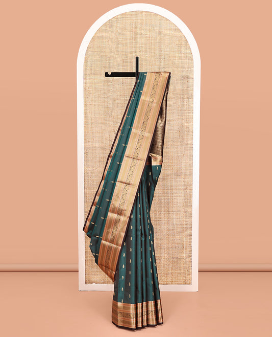 Blue Vasundhara Lite Silk Mix Saree, Detailed with Zari Buttas All Over Its Body, Complemented by Contrast Border of Rekku, Manga Mokku, and Kodi Visiry Designs, Grand Jaal Pallu and Paired with a Contrast Blouse