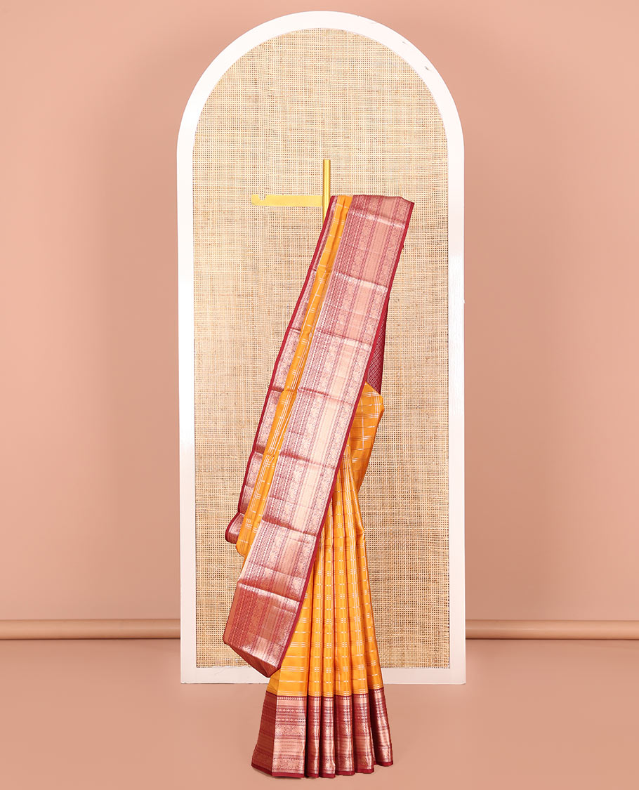 Orange Vasundhara Silk Saree Elevated with Zari Checks All Over Its Body, Complemented by a Contrast Border of Manga, Rudraksham, Yaali, Neli, and Muthu Designs, Zari Rich Jaal Pallu, and Paired with a Contrast Blouse