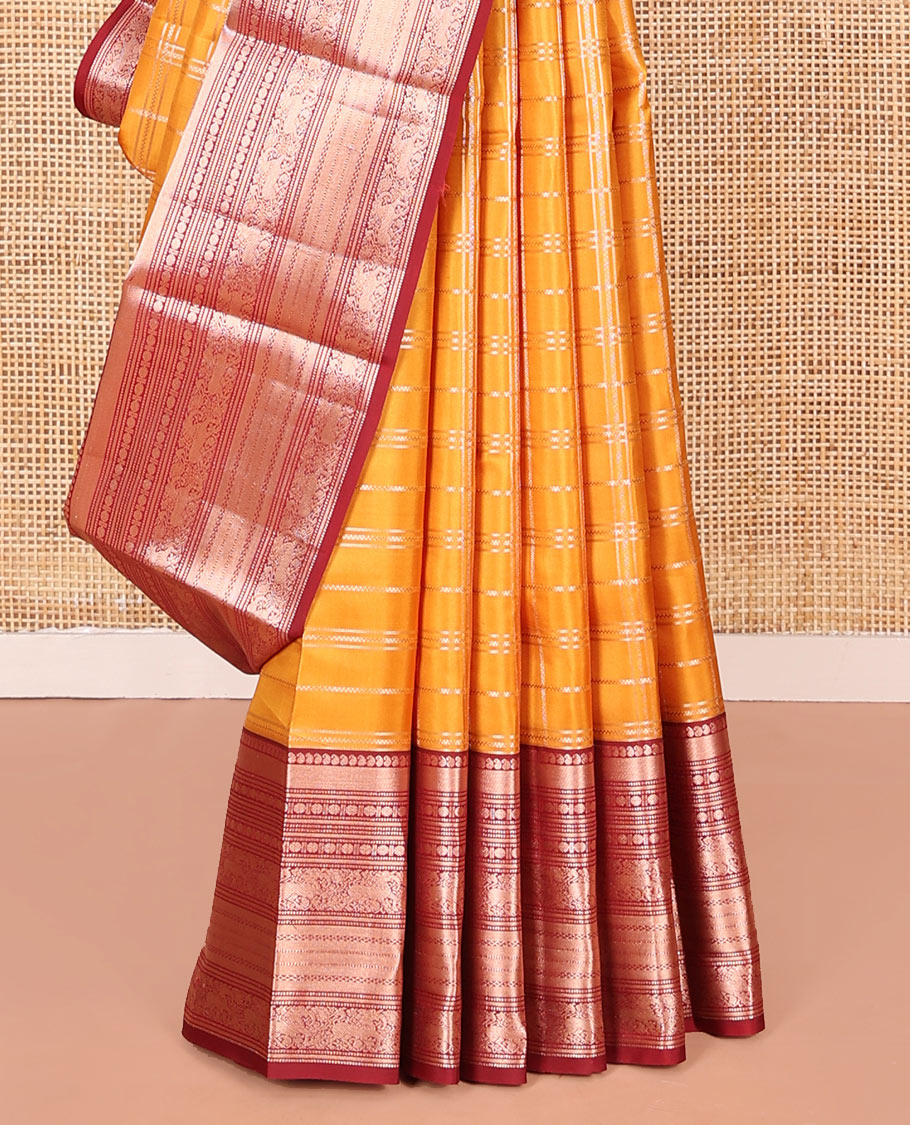 Orange Vasundhara Silk Saree Elevated with Zari Checks All Over Its Body, Complemented by a Contrast Border of Manga, Rudraksham, Yaali, Neli, and Muthu Designs, Zari Rich Jaal Pallu, and Paired with a Contrast Blouse