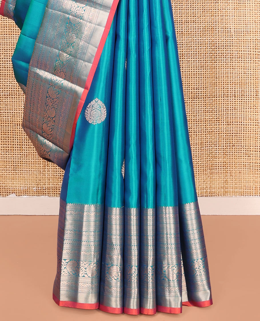 Blue Vasundhara Silk Saree, Accentuated with Zari Buttas on Its Body, Highlighted by a Zari Border of Rekku, Muthu, Diamond, and Kodi Visiry Designs, Grandly Woven Jaal Pallu, and Paired with a Matching Blouse