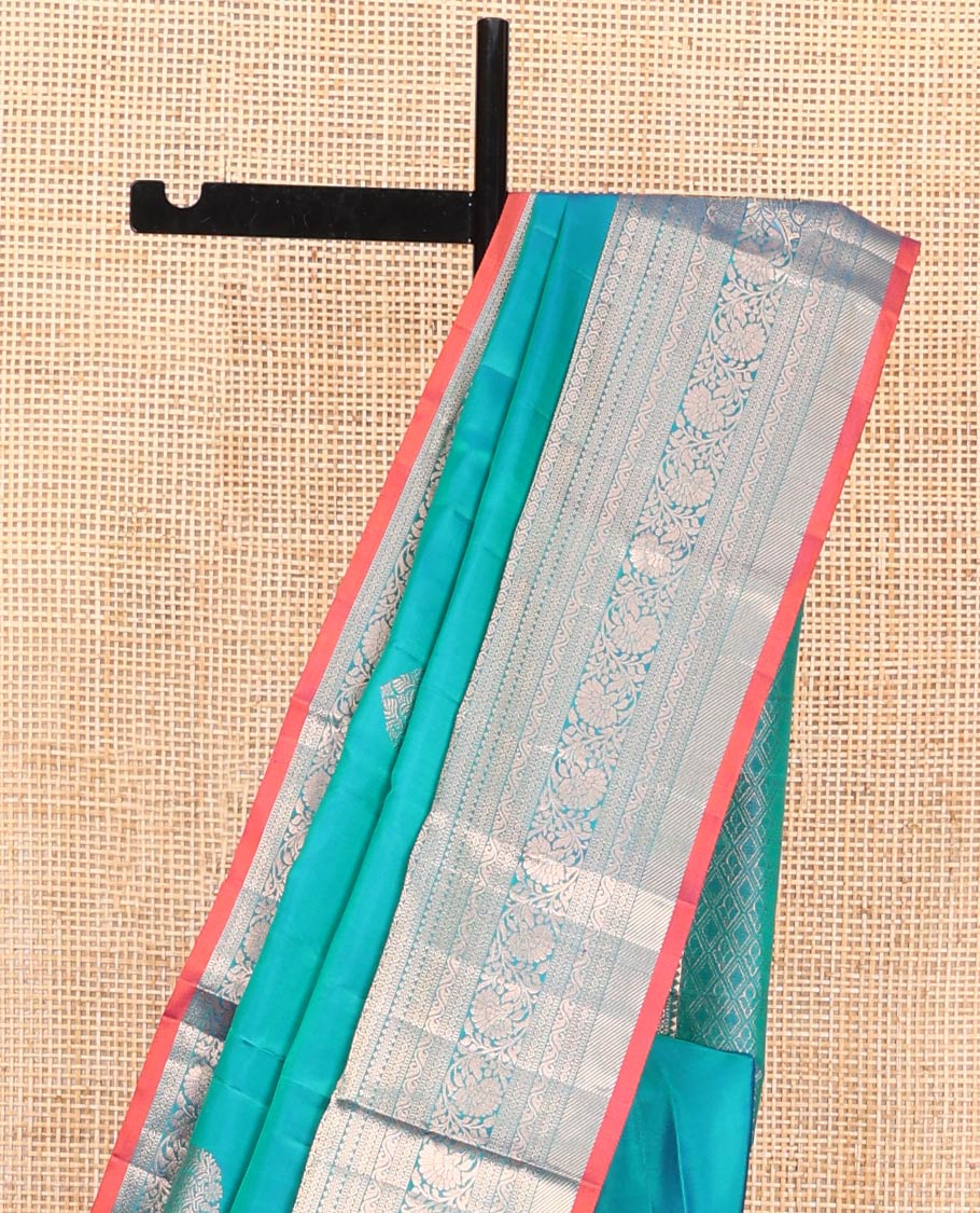 Blue Vasundhara Silk Saree, Accentuated with Zari Buttas on Its Body, Highlighted by a Zari Border of Rekku, Muthu, Diamond, and Kodi Visiry Designs, Grandly Woven Jaal Pallu, and Paired with a Matching Blouse