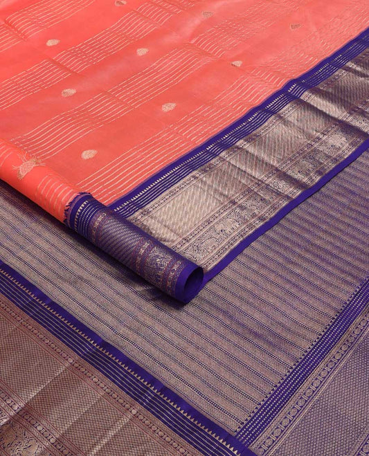 Orange zari design silk saree, contrast border of rekku, Muthu, kathir, rudraksham, and yaanai motifs, and geometric patterned pallu