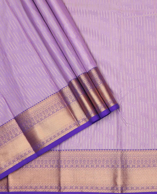 Purple art silk pavadai material, zari design with contrast traditional zari border skirt, and contrast blouse