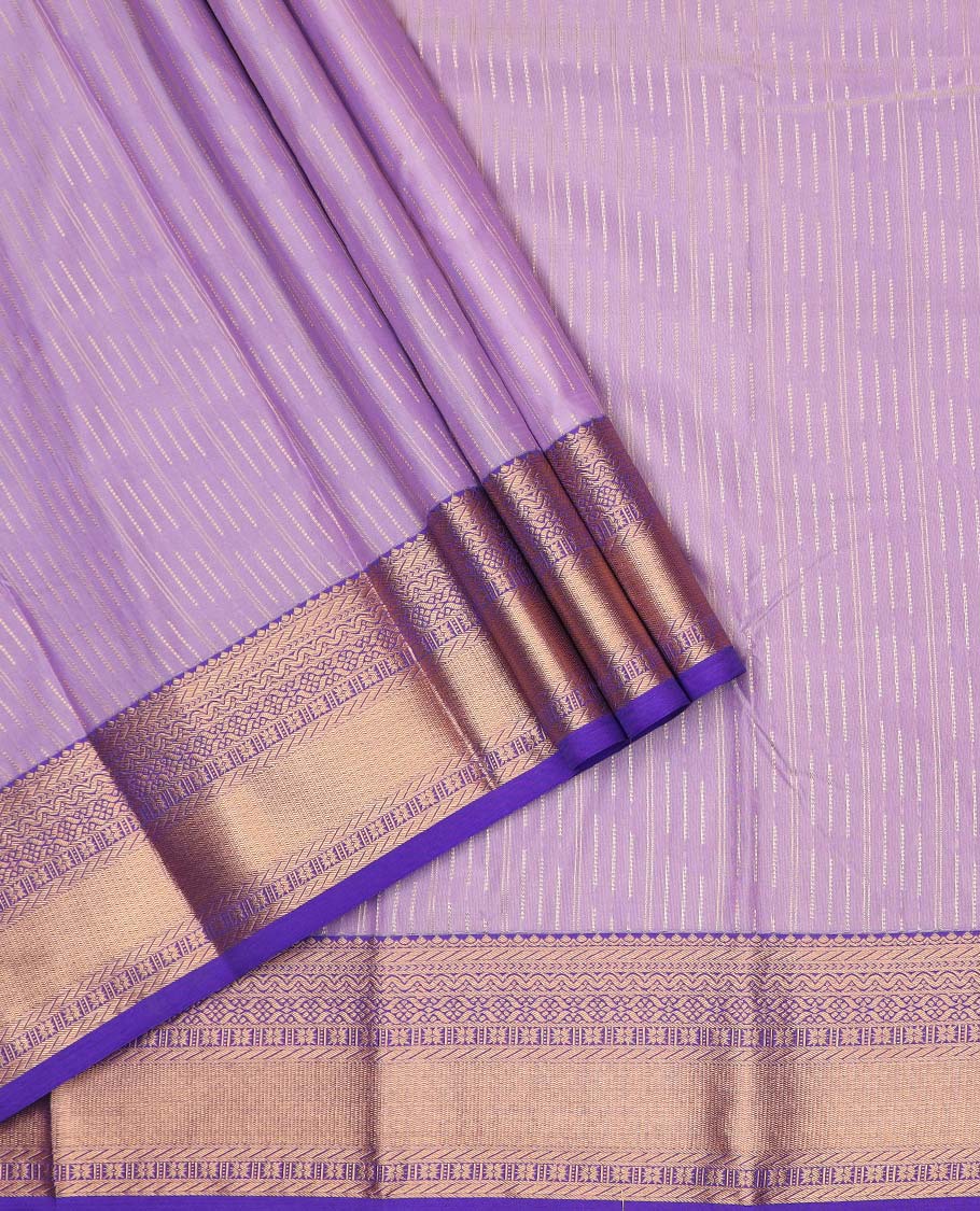 Purple art silk pavadai material, zari design with contrast traditional zari border skirt, and contrast blouse