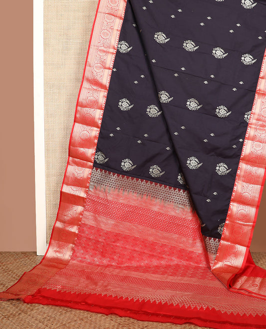 Black zari buttas gift saree, contrast traditional zari design border, and geometric patterned pallu
