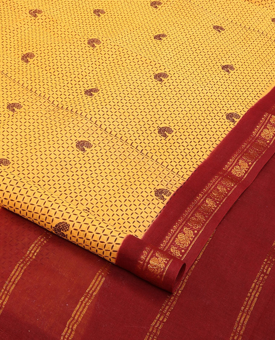 Yellow checked and peacock nine-yard cotton saree, contrast traditional zari border, and pallu of stripes