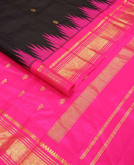 Black buttas kancheepuram silk saree with contrast border of rekku, thilakam mokku, banaras design & zari design pallu