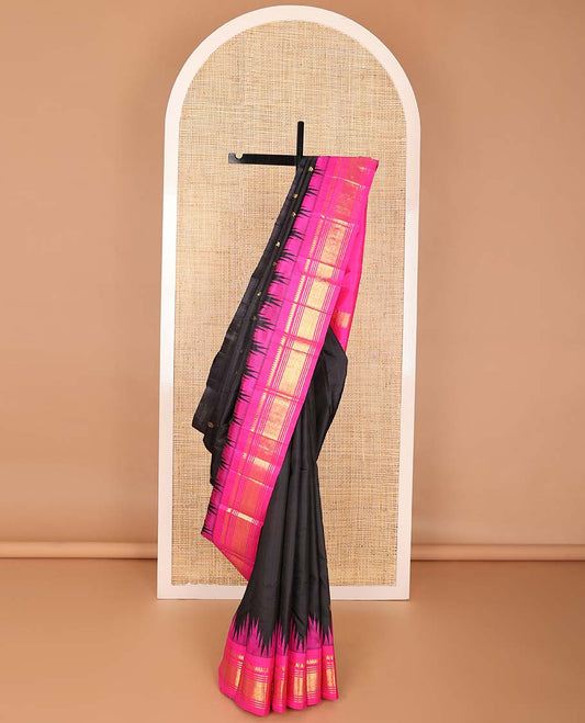 Black buttas kancheepuram silk saree with contrast border of rekku, thilakam mokku, banaras design & zari design pallu