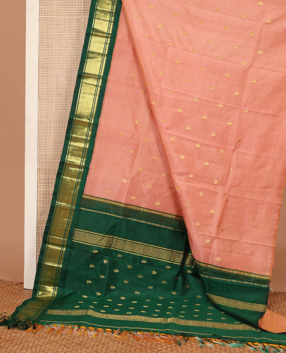 Peach zari buttas Kanchipuram silk saree, contrast one-sided korvai zari border of thilakam mokku, banaras, and jaal, and zari design pallu