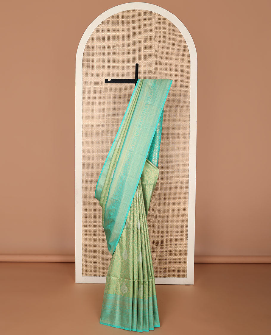 Green floral jacquard soft silk saree with contrast intricate zari design border & floral design pallu