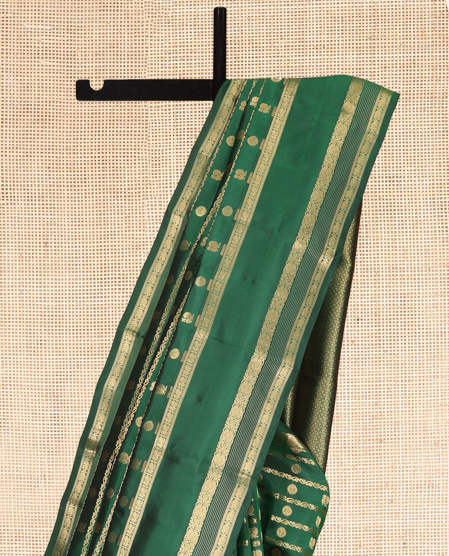 Green Vasundhara Lite Silk Mix Saree, Mesmerized with Zari Buttas and Stripes, a Zari Rettai Pettu Border of Rekku, Muthu, Mayil, Kodi Visiry, and Yaanai, Grand Pallu, and a Contrast Blouse