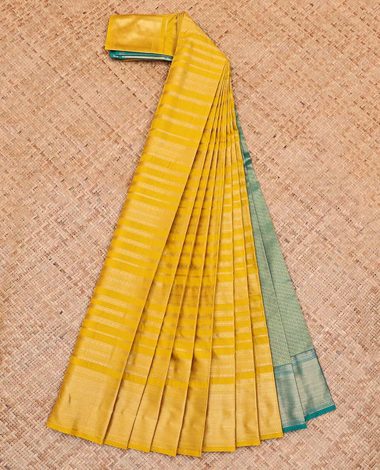 Yellow Budget Silk Saree, Subtly Enriched with Zari Stripes All Over Its Body, Highlighted by Traditional Zari Designs Woven Border, Contrast Colored Grand Pallu and Paired with a Contrast Blouse