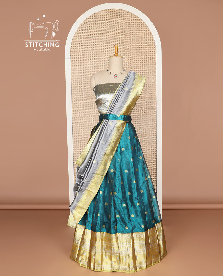 Blue buttas tissue half saree with contrast zari design border, zari design blouse & floral design dhavani