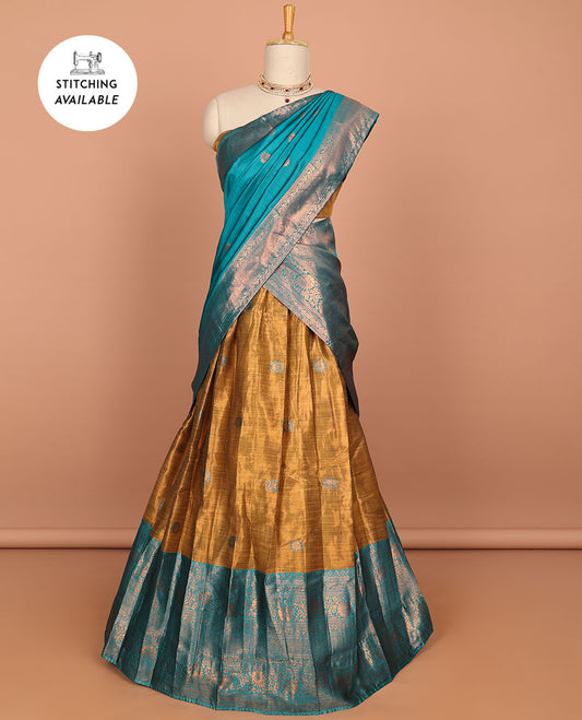 Brown buttas art silk half saree with contrast traditional zari border, argyle pattern blouse & buttas with zari border dhavani