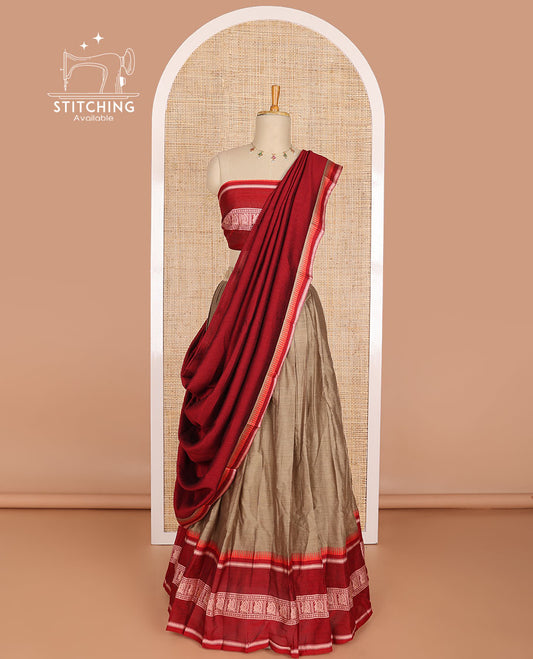Light brown cotton half saree with contrast peacock design border, peacock design blouse & temple border dhavani