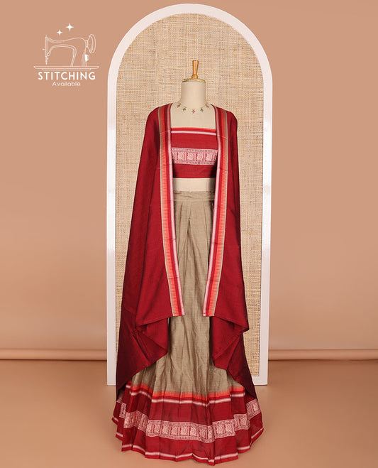 Light brown cotton half saree with contrast peacock design border, peacock design blouse & temple border dhavani