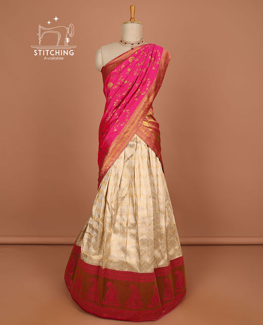 Cream geometric design half saree with contrast zari border, zari design blouse & pink floral zari design dhavani