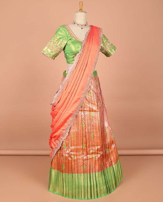 Orange floral jacquard semi-stitched half saree with contrast zari border, embroidered blouse & scallop border dhavani