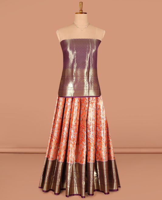 Orange Art Silk Pavadai Material Set, Prettified with Floral Jacquard Design on Its Skirt, Complemented by a Contrast Traditional Zari Woven Border of Paisley Designs, and Paired with a Contrast Jacquard Blouse