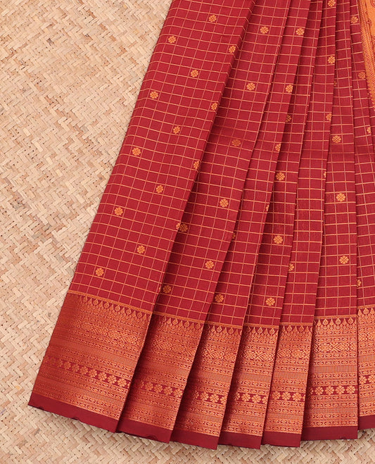 Maroon Budget Silk Saree, Spotlighted with Zari Buttas and Checks All Over Its Body, Highlighted by a Traditional Zari Design Border, Grand Pallu, and Paired with a Matching Blouse