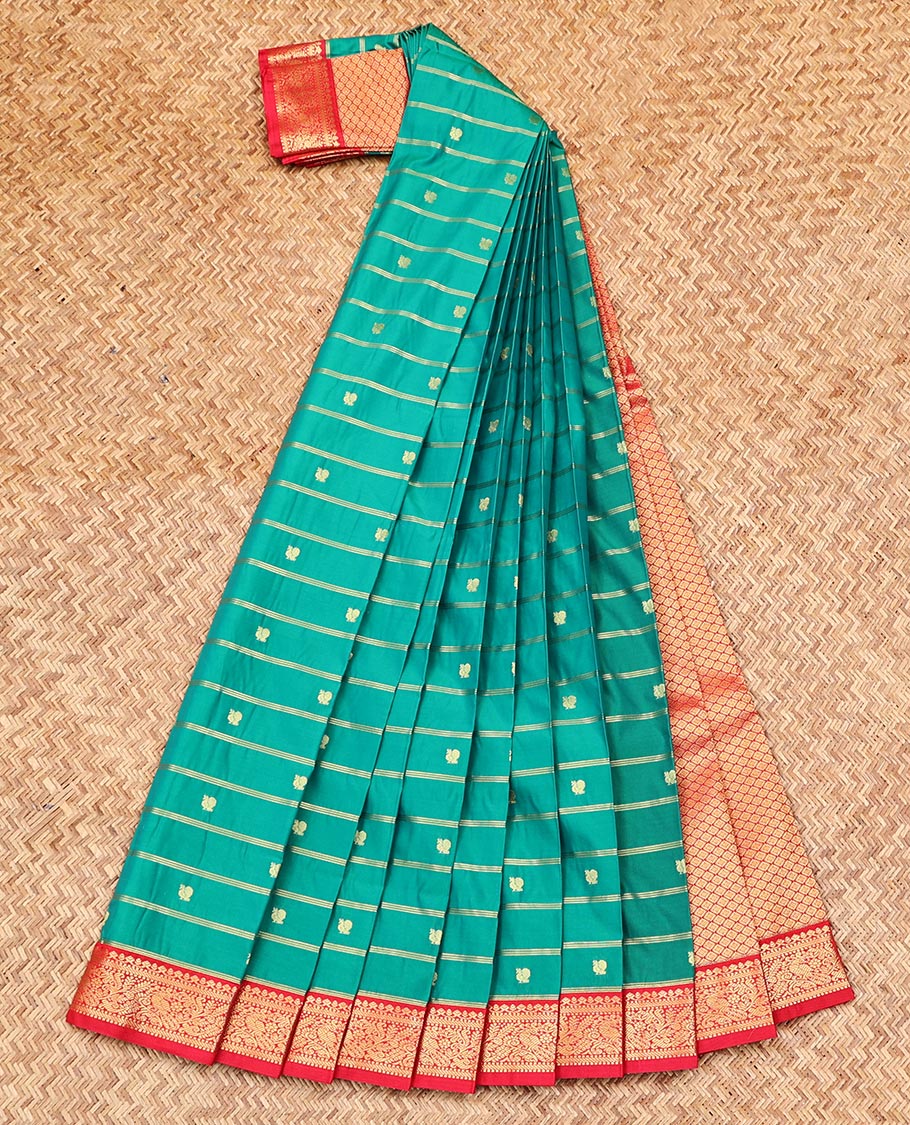 Green Budget Silk Saree, Enriched with Peacock Zari Buttas and Stripes on Its Body, Complemented by a Contrast Traditional Zari Rettai Pettu Border, Grand Jaal Pallu, and Paired with a Contrast Blouse