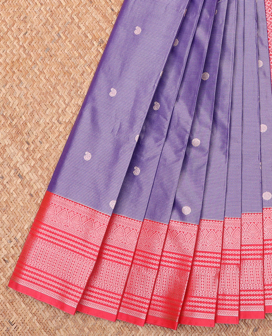 Lavender Budget Silk Saree, Subtly Sparkled With Zari Buttas and Stripes All Over Its Body, Complemented by Contrast Traditional Zari Designs Woven Border, Grand Jaal Pallu and Paired with a Contrast Blouse