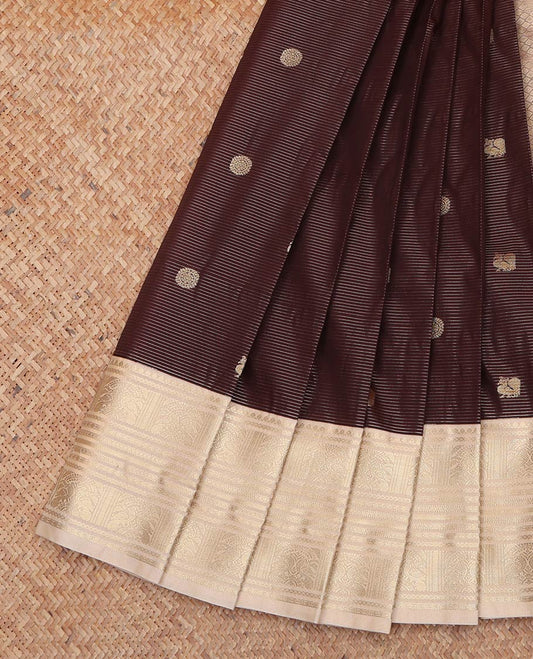 Brown Budget Silk Saree, Detailed with Stripes and Chakram Buttas All Over Its Body, Complemented by Contrast Traditional Zari Designs Woven Border, Jaal Pallu and Paired with a Contrast Blouse