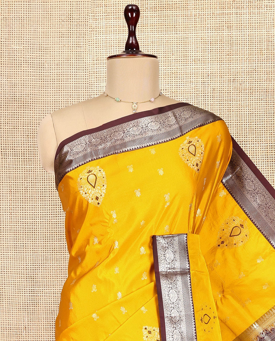 Yellow Budget Silk Saree, Mesmerized with Zari Buttas, Complemented by a Contrast Traditional Border, Pallu of Diagonal Stripes, and a Contrast Blouse