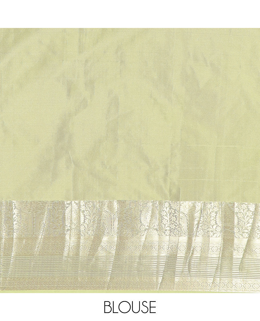 Green thilakam buttas budget silk saree, contrast traditional zari motifs border, and intricately designed pallu