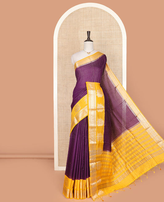 Purple micro-checked assam silk saree, contrast traditional zari border of floral designs, and zari striped pallu