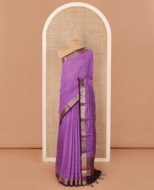 Lavender horizontal striped Assam silk saree, traditional zari border, and zari-rich gleaming pallu