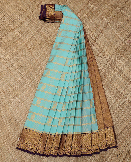 Blue Budget Silk Saree Woven with Zari Stripes and Floral Zari Buttas, Complemented with a Contrast Traditional Zari Design Border, Zari Elevated Pallu, and Paired with a Contrast Blouse