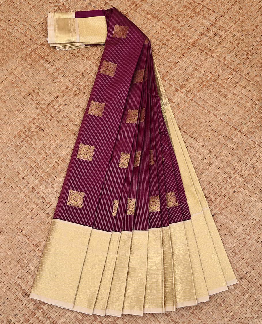 Maroon Budget Silk Saree, Mesmerized with Zari Buttas and Stripes on Its Body, Complemented by a Contrast Traditional Zari Design Border, Sparsely Woven Jaal Pallu, and Paired with a Contrast Blouse