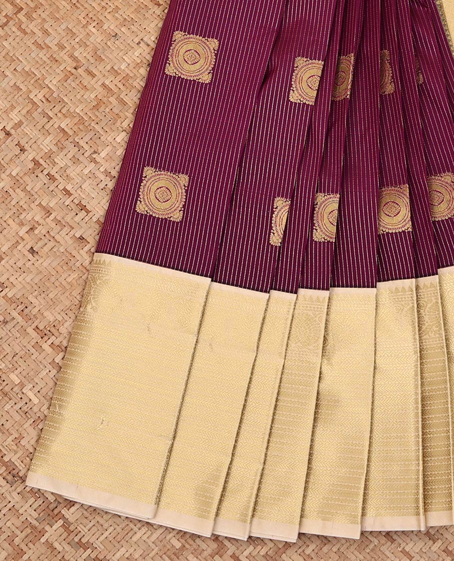 Maroon Budget Silk Saree, Mesmerized with Zari Buttas and Stripes on Its Body, Complemented by a Contrast Traditional Zari Design Border, Sparsely Woven Jaal Pallu, and Paired with a Contrast Blouse
