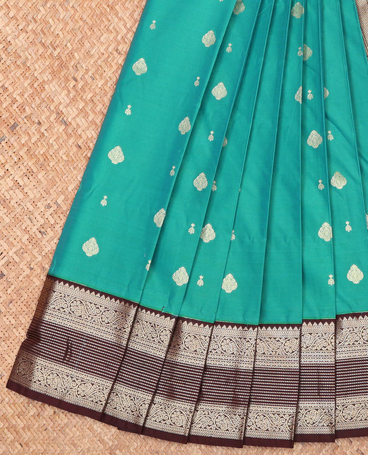 Green Budget Silk Saree, Decked Up with Zari Buttas on Its Body, Complemented by a Contrast Traditional Zari Design Border, Geometric-Patterned Pallu, and Paired with a Contrast Blouse
