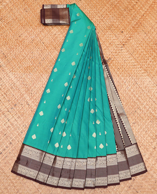 Green Budget Silk Saree, Decked Up with Zari Buttas on Its Body, Complemented by a Contrast Traditional Zari Design Border, Geometric-Patterned Pallu, and Paired with a Contrast Blouse