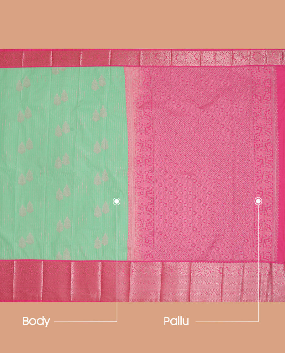 Green Budget Silk Saree Sparsely Sparkled with Tree Buttas and Stripes All Over Its Body, Complemented by a Contrast Border of Traditional Zari Designs, Pallu Gleamed Up with Jaal Designs, and Paired with a Contrast Blouse