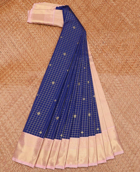 Blue Budget Silk Saree Gleamed Up with Peacock Chakram Buttas and Micro Checks, Complemented by a Contrast Traditional Zari Motifs Border, Pallu Decked Up with Zari, and Paired with a Contrast Blouse
